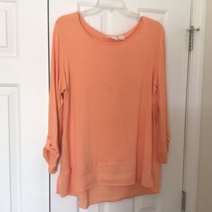 Chico’s top Size 2 ( L) in orange .
